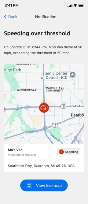 A phone screen showing a Ford Pro Telematics notification titled “Speeding over threshold.” It displays a map of Dearborn, Michigan, showing where Mo’s Van exceeded 58 mph in a 50-mph zone, with details on the vehicle, driver, and location, plus a button labeled “View live map.”